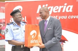 Chief Executive Officer & Managing Director, Airtel Nigeria, Segun Ogunsanya presenting a gift to Deputy Commissioner of Police (Administration), Lagos State and representative of Commissioner of Police, Lagos State, Felix G. Ogundeji at the Commissioning of a Police Post renovated by Airtel,  in Lagos